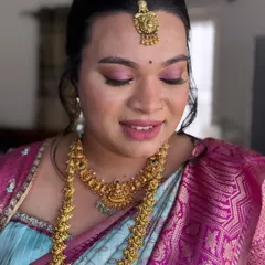 A closer look at the baby shower makeup. The focus is on radiant skin and soft, shimmery eyeshadow that makes her eyes sparkle.