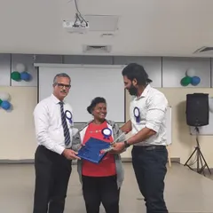 Receiving recognition for my participation in the health and fitness orientation program. It's rewarding to contribute to the community and share my expertise.