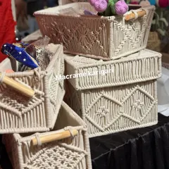 A closer look at our lidded macramé storage boxes. These are great for keeping things tidy and out of sight, while still adding a touch of boho elegance to your room.
