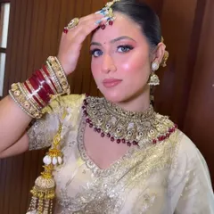 The complete bridal ensemble from my Amritsar Masterclass, featuring traditional jewelry and a classic red bindi that ties the whole look together.