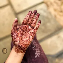 This is the beautiful, rich stain from my organic henna paste after it has had time to mature. The color is deep and even, highlighting the intricate floral and paisley details.