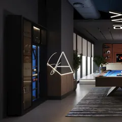 We designed this lounge and bar area as part of a private wellness center. The moody, dark tones, custom neon lighting, and sleek pool table come together to create a sophisticated space for relaxation and social connection after a workout.