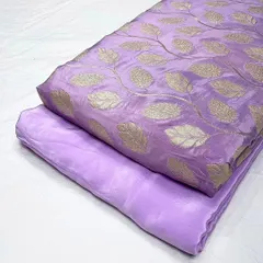 A lovely lavender jacquard fabric with a subtle gold leaf design. This set, complete with matching plain crepe, is ideal for making elegant dresses or sophisticated ethnic wear.