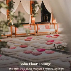 A cozy and intimate boho floor lounge setup. Low mattresses with an assortment of pink and cream cushions create a relaxed, free-spirited atmosphere perfect for a Mehendi or a casual get-together.