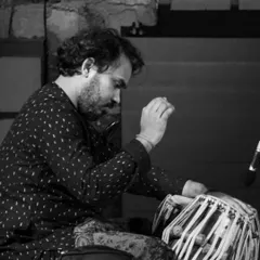 An artistic shot from the Tibha festival at Art Circle Ratnagiri. The rustic background and monochrome feel give it a timeless quality.