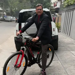 Embarking on the first working day of a new year on a bicycle. It serves as a personal reminder that the path to success is paved with humility, hard work, and honesty.
