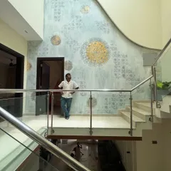Standing proud in front of this magnificent, double-height wall. The client approved the design on the spot, and pulling off this design was a surprise I gave to myself!