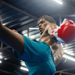 Power and precision in a single motion. One of our athletes executes a perfect high kick during a Muay Thai training session. We drill techniques like this until they become second nature.