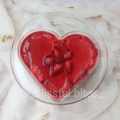 My homemade no-bake Strawberry Cheesecake in a heart-shaped bowl. It's a beautiful and delicious way to celebrate strawberry season, perfect for sharing with a loved one.