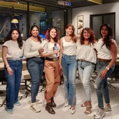 Posing with the amazing members of a women's biker group after hosting their get-together. I can tailor my hosting style to fit the vibe of any group, ensuring a successful event.