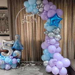 Another perspective of the 'Frozen' themed home decor, showing how the arch and number bouquet create a festive corner for a child's birthday party.