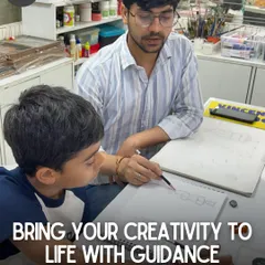 An instructor provides one-on-one guidance to a young student on his sketching fundamentals, ensuring he gets the expert attention needed to grow.