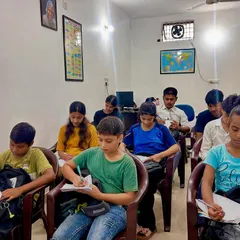 Welcome to my Success Academy. Here, we create a focused learning environment where every student gets the attention they need. This image shows a typical session where students are deeply engaged in their work, building a solid foundation for their exams.