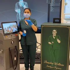 Our expert technician stands beside the Soprano Titanium machine, the advanced technology we use for all our laser hair reduction treatments. The screen behind shows a 3D model, illustrating the precision we bring to every session.
