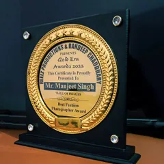 The Gold Era Awards 2022 plaque, recognizing Mr. Manjeet Singh of Wall of Images as the Best Fashion Photographer.