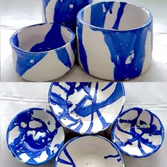 I love the contrast of the deep blue against the white clay. Each of these handmade bowls has its own unique pattern, a small universe of splashes and drips.