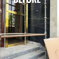 Here is the 'before' shot of the same entrance. It's amazing what a difference a well-designed plant installation can make.