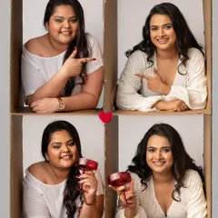 A fun and creative "in the box" photoshoot to celebrate friendship. These two besties had a blast pointing at each other and raising a glass, capturing the playful spirit of their bond.