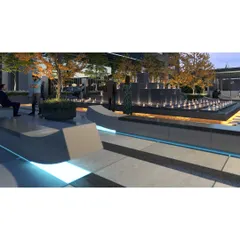A dynamic, multi-tiered water feature serves as the plaza's centerpiece, adding the soothing sound of water and a strong visual anchor to the design.