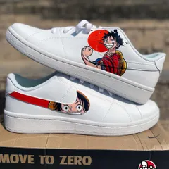 We brought the King of the Pirates to this pair of Nikes. One shoe features Monkey D. Luffy in his classic pose against a red sun, while the other has his face peeking through the swoosh. It's the perfect custom sneaker for any One Piece fan.