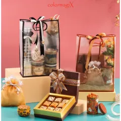A chic and modern gifting option, these transparent PVC bags with black and gold accents are filled with sweets and favors, offering a stylish preview of the gifts inside.