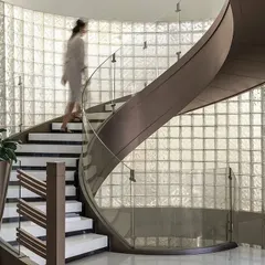 This sculptural spiral staircase at The Layered Office in New Delhi is a centerpiece of the renovation, demonstrating our focus on creating elegant architectural details that enhance the user's experience of a space.