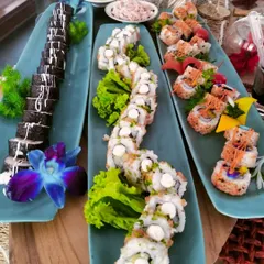 A trail to happiness. Our sushi platters are a feast for the eyes, featuring a variety of rolls to please every palate.