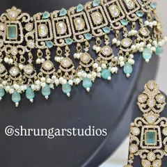 Unique caption for media id 4 describing the specific jewellery and look.