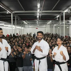 We were honored to conduct a self-defense awareness program for nearly 300 women at Ather. This image captures the energy and scale of our corporate workshops, where we empower teams with essential safety skills in a large group setting.