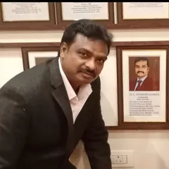 Here I am next to my plaque in the Karnataka Olympic Association's Hall of Fame. Being recognized in my home state is a special honor and a reminder of the journey from my local village to the national stage.