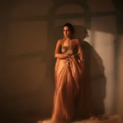 Here, we played with shadows to add depth and mystery. The gobo light effect mimics window light, casting an interesting pattern that makes this cinematic portrait more dynamic and intriguing.