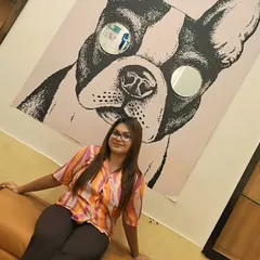 This is our main reception and lounge area, where I welcome you and your pets. The fun decor reflects my love for animals, and it's a comfortable space for everyone to get acquainted before a stay or grooming session.