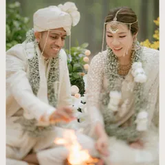An intimate Hindu ceremony in the middle of a Japanese forest. This image beautifully represents the blending of cultures and the universal sanctity of marriage vows.