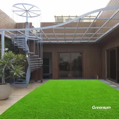 The magic of a terrace transformation. We installed an open pergola, WPC wall paneling, and a vibrant green artificial lawn to completely redefine the look and feel of this expansive outdoor space.