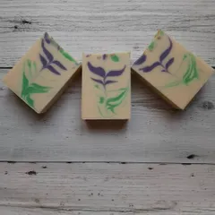 A trio of my Blooming Lavender soaps, showcasing the beautiful purple and green patterns. These bars are made with skin-loving oils and butters for a creamy, nourishing lather.