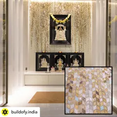 A pooja room is the spiritual heart of a home, and I designed this one to feel truly ethereal. We used a backdrop of cascading white and gold mosaic tiles that shimmer in the light, creating a serene and divine atmosphere for prayer and reflection, all while being Vastu-compliant.