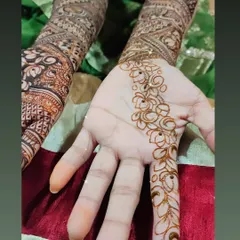 This image shows the "cutwork" technique in progress. I apply the design and then carefully remove parts of the paste to create the negative space effect.