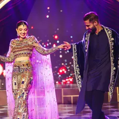 From the first step to the last twirl, they danced like no one was watching. This shot captures the pure joy and connection between the couple during their sangeet performance.
