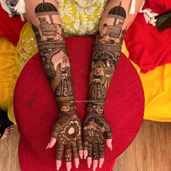 I love telling stories through my art. This traditional bridal mehendi features intricate figures, including a bride in her doli and majestic elephants, to make your design truly unique and personal.