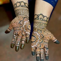 A non-bridal design for a house warming ceremony, featuring a large, intricate mandala that covers the entire palm.