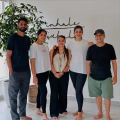 A happy group photo with our teachers and community members. The smiles and relaxed energy in this picture capture the supportive and friendly environment we cultivate at the studio.