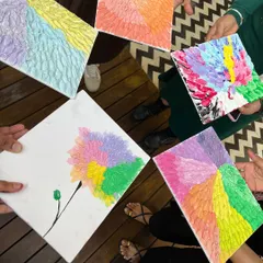 A collection of artworks created by participants in a recent texture art workshop. It's amazing to see how everyone expresses their own style using the same techniques, resulting in a beautiful variety of floral palettes.
