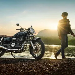 Another shot from the Honda campaign, this time set against a serene natural landscape at sunset. I chose a dark leather jacket and jeans to create a classic rider look that feels both rugged and peaceful.