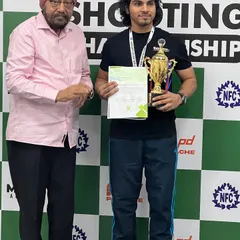 Recognizing our champions is a huge part of the experience. Here, ISSF Air Pistol Champion Anmol Jain receives his trophy and prize money at the 1st MURC Shooting Championship. I believe in rewarding excellence and giving athletes the recognition they've earned.