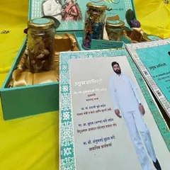 A different angle of the hamper, showing the personalized cards for special guests, making each recipient feel truly honored.