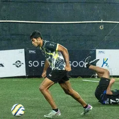 An intense moment of gameplay from the TAL 7s League, with our player driving the ball forward while a teammate takes a fall.