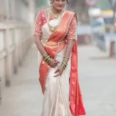 A full-length view of the pre-pleated saree on the Telugu bride. The pleats are uniform and the drape is secure, showcasing the crisp and clean finish that my pre-pleating service provides.