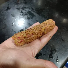 Here is one of my handmade vegetable sausages before it gets cooked. You can see the texture from all the fresh ingredients packed inside. I never thought I would make these, but they taste so good.