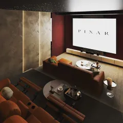 This high-angle render provides a comprehensive view of another home theater layout, featuring both a large sofa and tiered recliner seating. This demonstrates our ability to design versatile entertainment spaces that can accommodate both casual viewing and dedicated movie nights.