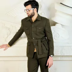 An olive green safari-style jacket with a matching belt and trousers. This co-ord set is tailored from luxurious fabric for a bold statement of sophistication.